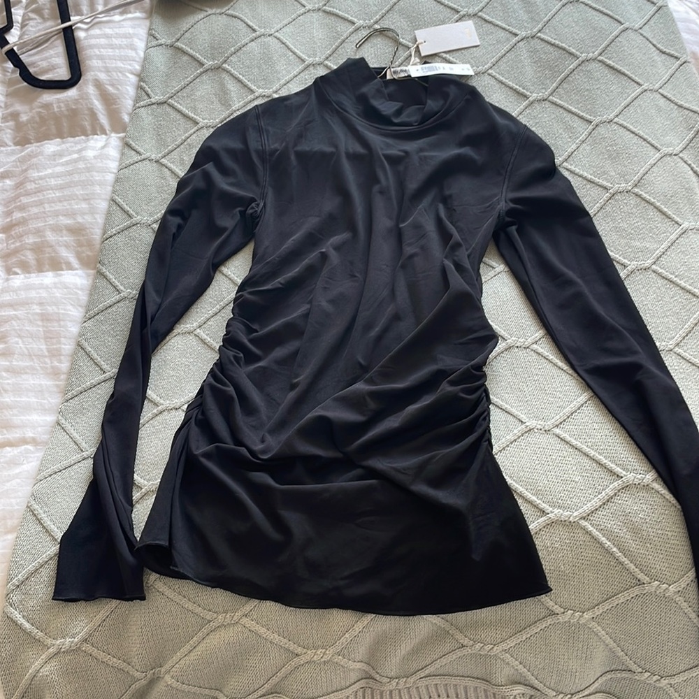 New black turtle neck with scrunching on side